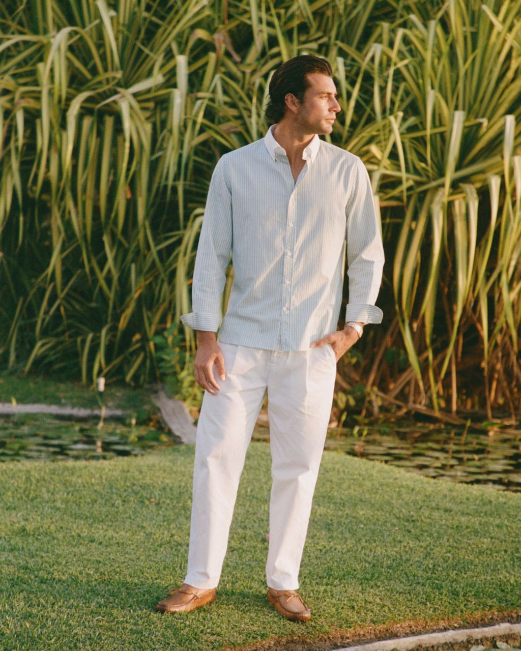 Camisa social verde pistache listrada, perfeita para o trabalho.
