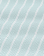 Camisa verde pistache listrada para looks casuais e sofisticados.
